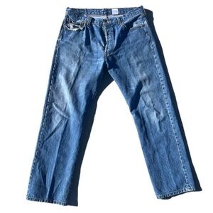 Vintage 2006 Levi’s 501 button fly front all blue distressed washed denim jeans